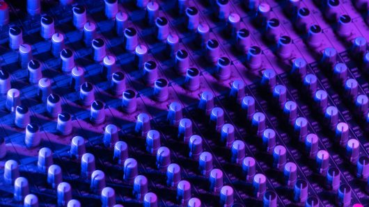 Mixes on CD players or track at nightclub during party for DJ. Nightlife of disco club in disco pub club bar background for party music dancing festival performance. Entertainment nightlife.